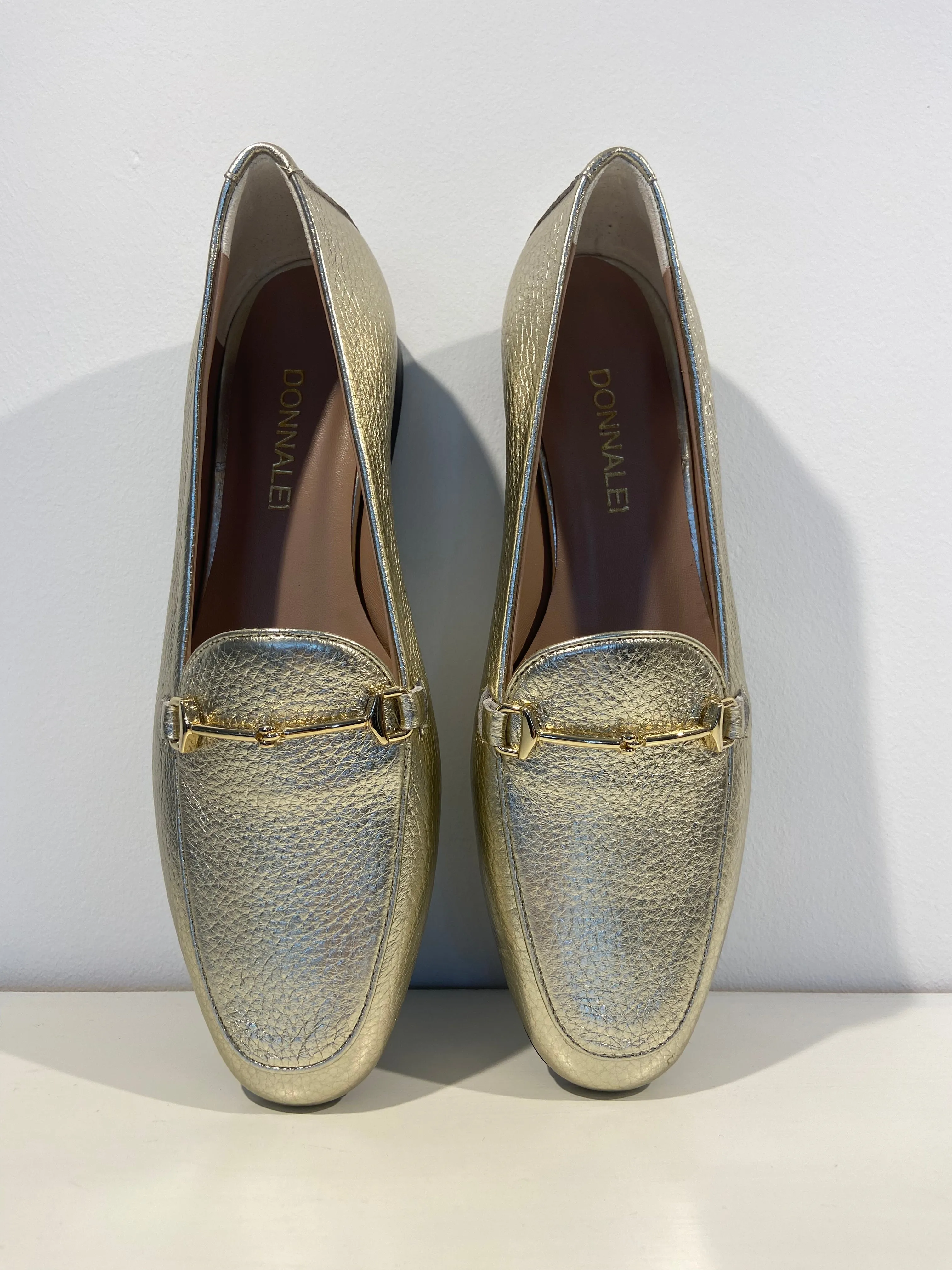 Gold Italian loafers with fine snaffle